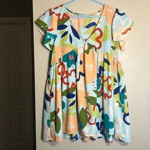 Fun boutique tunic top. Mod bright design. Cap sleeve size m. Like new. Perfect